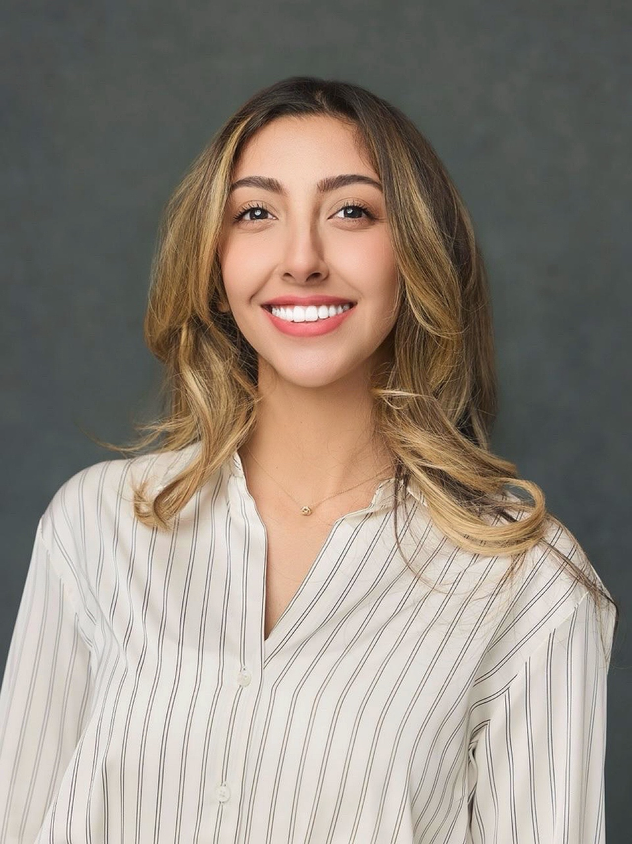 Dr. Ava Arabshahi smiling at the camera